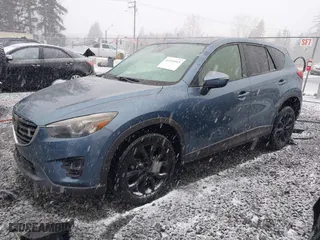 2016 Mazda CX-5 Grand Touring with VIN JM3KE4DY4G0687230, listed as a IAAI auction lot 41510915 with NaN miles. Bid and sale history available at carsss.com. Image 18.