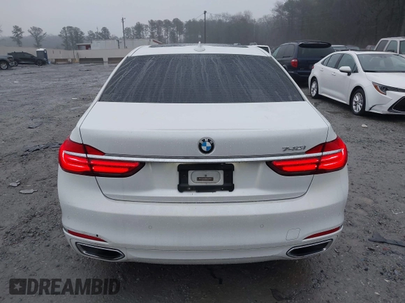 2017 BMW 7 Series 740i z VIN WBA7E2C51HG740000, wystawiony jako IAAI lot #41407048 z przebiegiem 114 929 mil mil oraz . Historia ofert i sprzedaży dostępna na DreamBid. Obrazek 16.