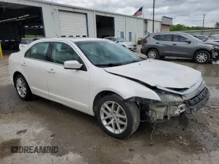 2012 Ford Fusion SEL z VIN 3FAHP0JA3CR184074, wystawiony jako Copart lot #51973675 z przebiegiem 192 732 mil mil oraz Szkoda całkowita • Salvage title. Historia ofert i sprzedaży dostępna na DreamBid. Obrazek 4.