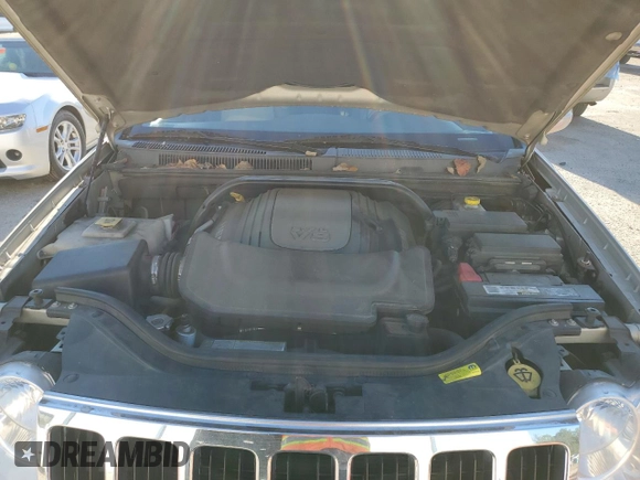 2010 Jeep Grand Cherokee Limited z VIN 1J4RR5GT4AC145692, wystawiony jako Copart lot #75649614 z przebiegiem 99 362 mil mil oraz Szkoda całkowita • Salvage title. Historia ofert i sprzedaży dostępna na DreamBid. Obrazek 12.