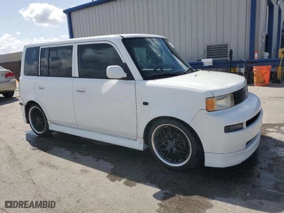 2004 Scion xB with VIN JTLKT324340167884, listed as a Copart auction lot 52494435 with 157,671 mi miles and Salvage Title. Bid and sale history available at carsss.com. Image 4.