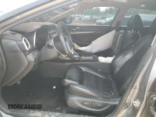 2017 Nissan Maxima SL z VIN 1N4AA6AP0HC367013, wystawiony jako Copart lot #59253975 z przebiegiem 136 834 mil mil oraz Szkoda całkowita • Salvage title. Historia ofert i sprzedaży dostępna na DreamBid. Obrazek 7.