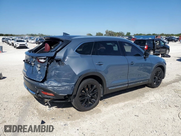 2023 Mazda CX-9 Carbon Edition with VIN JM3TCBDY8P0653953, listed as a Copart auction lot 48810905 with 27,677 mi miles and Salvage title. Bid and sale history available at DreamBid. Image 3.