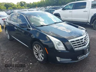 2013 Cadillac XTS Luxury z VIN 2G61P5S39D9107938, wystawiony jako IAAI lot #42800959 z przebiegiem 174 645 mil mil oraz . Historia ofert i sprzedaży dostępna na DreamBid. Obrazek 1.