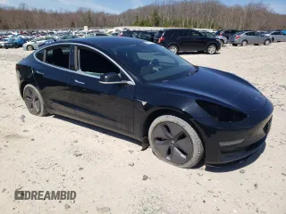 2019 Tesla Model 3 Mid Range z VIN 5YJ3E1EA6KF306887, wystawiony jako Copart lot #52401625 z przebiegiem 105 948 mil mil oraz Szkody całkowita. Historia ofert i sprzedaży dostępna na DreamBid. Obrazek 4.