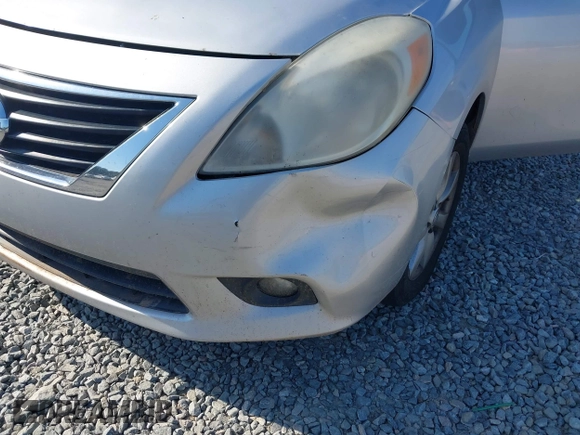 2012 Nissan Versa SV with VIN 3N1CN7APXCL867337, listed as a IAAI auction lot 42079349 with 260,442 mi miles. Bid and sale history available at carsss.com. Image 6.