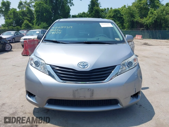 2012 Toyota Sienna LE AAS z VIN 5TDKK3DC0CS210995, wystawiony jako IAAI lot #42439317 z przebiegiem 183 029 mil mil oraz . Historia ofert i sprzedaży dostępna na DreamBid. Obrazek 12.