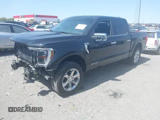 2021 Ford F-150 XL with VIN 1FTFW1ED7MFA77770, listed as a IAAI auction lot 41882929 with 76,099 mi miles and . Bid and sale history available at DreamBid. Image 2.
