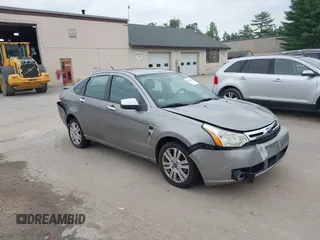 2008 Ford Focus SE with VIN 1FAHP35N08W284149, listed as a IAAI auction lot 40124009 with 125,334 mi miles. Bid and sale history available at carsss.com. Image 1.