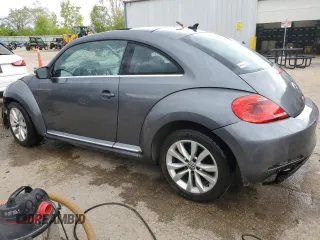2014 Volkswagen Beetle 2.0L TDI z VIN 3VWJL7AT2EM647028, wystawiony jako Copart lot #55155265 z przebiegiem Nie podano mil oraz Nie do naprawy. Historia ofert i sprzedaży dostępna na DreamBid. Obrazek 2.