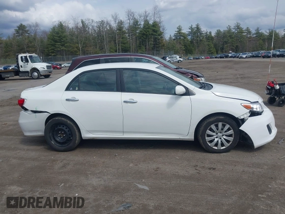 2012 Toyota Corolla L with VIN 2T1BU4EE4CC884754, listed as a IAAI auction lot 42041998 with 113,615 mi miles. Bid and sale history available at carsss.com. Image 13.