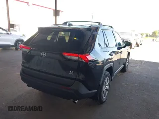 2021 Toyota RAV4 LE with VIN 2T3F1RFV1MC195589, listed as a IAAI auction lot 42509900 with 61,671 mi miles and . Bid and sale history available at DreamBid. Image 4.