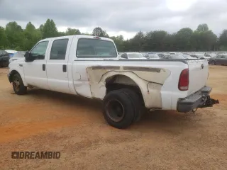 1999 Ford F-350 XL with VIN 1FTWW32FXXEB79284, listed as a Copart auction lot 53969905 with 241,082 mi miles and Salvage title. Bid and sale history available at DreamBid. Image 2.