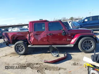 2021 Jeep Gladiator Overland z VIN 1C6HJTFGXML595781, wystawiony jako IAAI lot #41667696 z przebiegiem 31 438 mil mil oraz . Historia ofert i sprzedaży dostępna na DreamBid. Obrazek 13.