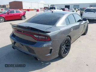 2016 Dodge Charger R/T with VIN 2C3CDXCT9GH346719, listed as a IAAI auction lot 42274215 with 114,169 mi miles and . Bid and sale history available at DreamBid. Image 4.
