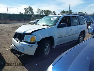 2006 GMC Envoy SLE with VIN 1GKDT13S662355509, listed as a IAAI auction lot 41628732 with 187,635 mi miles. Bid and sale history available at carsss.com. Image 2.