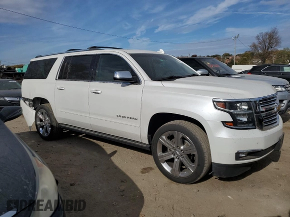 2019 Chevrolet Suburban Premier with VIN 1GNSKJKC4KR249147, listed as a Copart auction lot 79058174 with 88,514 mi miles and Salvage Title. Bid and sale history available at DreamBid. Image 4.
