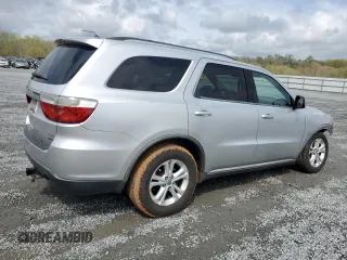2011 Dodge Durango Crew with VIN 1D4RD4GG5BC730013, listed as a Copart auction lot 50032075 with 273,407 mi miles and Salvage Title. Bid and sale history available at carsss.com. Image 3.