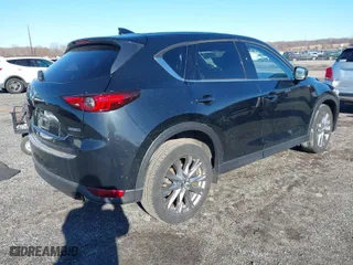 2021 Mazda CX-5 Grand Touring with VIN JM3KFBDM4M0471467, listed as a IAAI auction lot 41825406 with 43,529 mi miles. Bid and sale history available at carsss.com. Image 4.