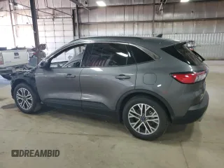 2021 Ford Escape SEL z VIN 1FMCU0H66MUB04206, wystawiony jako Copart lot #56638585 z przebiegiem Nie podano mil oraz Szkoda całkowita • Salvage title. Historia ofert i sprzedaży dostępna na DreamBid. Obrazek 2.