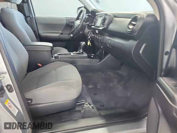 2019 Toyota Tacoma SR with VIN 5TFRX5GN1KX143485, listed as a IAAI auction lot 42763045 with 90,847 mi miles and . Bid and sale history available at DreamBid. Image 23.