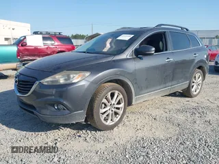 2013 Mazda CX-9 Grand Touring z VIN JM3TB2DA6D0424124, wystawiony jako IAAI lot #42032588 z przebiegiem 151 569 mil mil oraz . Historia ofert i sprzedaży dostępna na DreamBid. Obrazek 2.