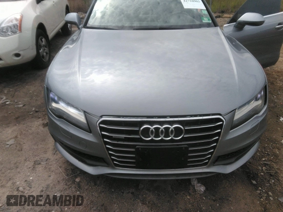 2013 Audi A7 Prestige with VIN WAU2GAFC0DN075637, listed as a IAAI auction lot 42710903 with 145,562 mi miles and . Bid and sale history available at DreamBid. Image 6.