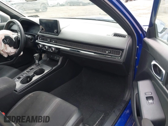 2023 Honda Civic Sport z VIN 2HGFE2F56PH502559, wystawiony jako IAAI lot #41558054 z przebiegiem 48 961 mil mil oraz . Historia ofert i sprzedaży dostępna na DreamBid. Obrazek 5.