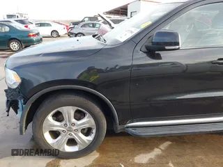2014 Dodge Durango Limited z VIN 1C4RDJDG5EC593711, wystawiony jako IAAI lot #41717501 z przebiegiem 151 107 mil mil oraz . Historia ofert i sprzedaży dostępna na DreamBid. Obrazek 21.