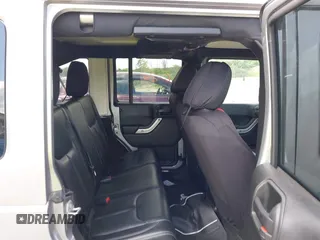 2018 Jeep Wrangler Unlimited Sahara with VIN 1C4BJWEGXJL806832, listed as a IAAI auction lot 42605892 with 90,535 mi miles and . Bid and sale history available at DreamBid. Image 8.
