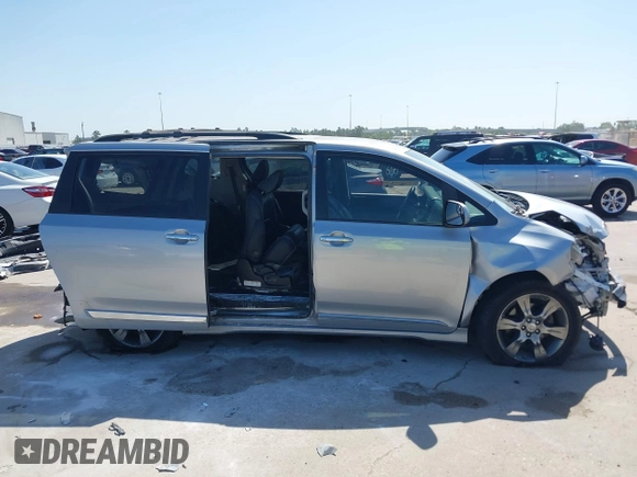 2015 Toyota Sienna SE with VIN 5TDXK3DC7FS684341, listed as a IAAI auction lot 41959077 with 154,377 mi miles and . Bid and sale history available at DreamBid. Image 14.