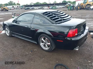 2001 Ford Mustang GT Deluxe with VIN 1FAFP42X01F256120, listed as a IAAI auction lot 42446560 with Not provided miles and . Bid and sale history available at DreamBid. Image 3.
