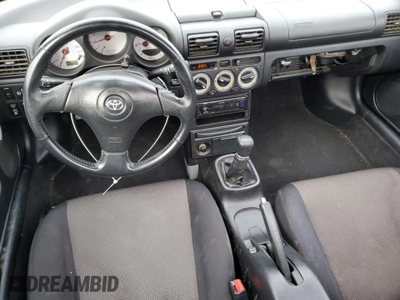 2003 Toyota MR2 z VIN JTDFR320530065705, wystawiony jako Copart lot #86298474 z przebiegiem 103 268 mil mil oraz Szkoda całkowita • Salvage title. Historia ofert i sprzedaży dostępna na DreamBid. Obrazek 8.