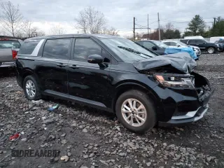 2023 Kia Carnival LX with VIN KNDNB4H32P6290920, listed as a Copart auction lot 82141794 with 28,597 mi miles and Salvage Title. Bid and sale history available at carsss.com. Image 4.