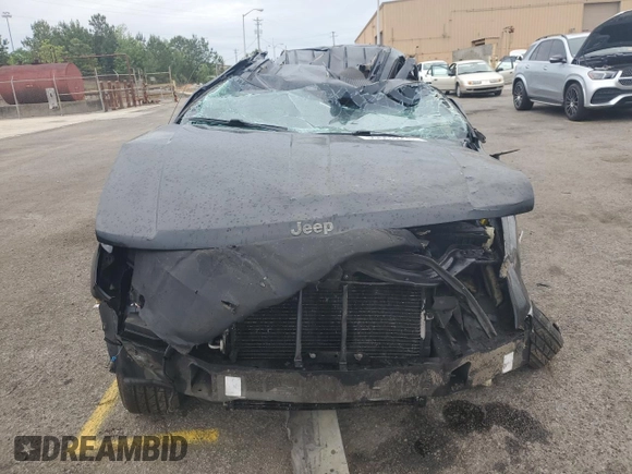 2000 Jeep Grand Cherokee Laredo with VIN 1J4G248S4YC390675, listed as a Copart auction lot 55652815 with Not provided miles and Salvage title. Bid and sale history available at DreamBid. Image 5.