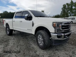 2021 Ford F-250 XL with VIN 1FT8W2BTXMEC41464, listed as a Copart auction lot 61588905 with 131,973 mi miles and Salvage title. Bid and sale history available at DreamBid. Image 4.