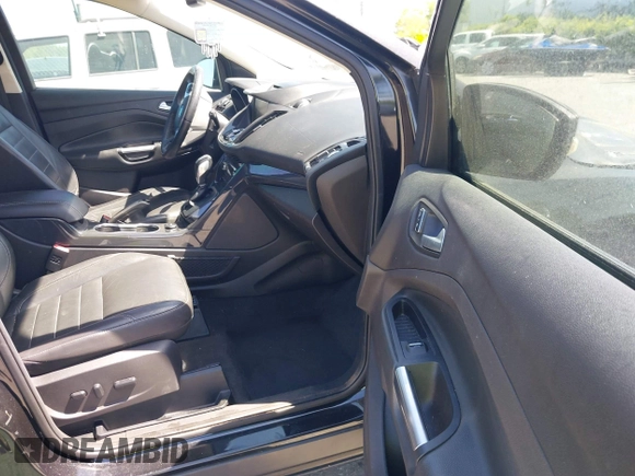 2015 Ford Escape Titanium с VIN 1FMCU0JX5FUB87813, выставлен на аукционе IAAI как лот 42035295 с пробегом 148 430 миль миль и . История ставок и продаж доступна на DreamBid. Изображение 5.