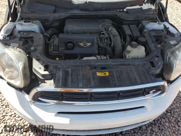 2016 MINI Countryman S with VIN WMWZC3C58GWT09694, listed as a Copart auction lot 57113235 with 126,082 mi miles and Salvage title. Bid and sale history available at DreamBid. Image 11.