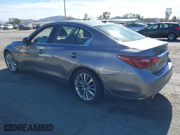 2021 Infiniti Q50 Luxe z VIN JN1EV7BP3MM701871, wystawiony jako IAAI lot #41383333 z przebiegiem 28 634 mil mil oraz . Historia ofert i sprzedaży dostępna na DreamBid. Obrazek 3.