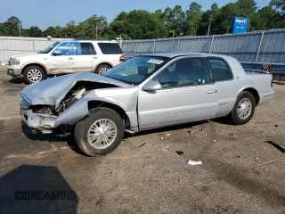 1997 Mercury Cougar z VIN 1MELM6245VH627028, wystawiony jako Copart lot #65533884 z przebiegiem 74 360 mil mil oraz Szkody całkowita. Historia ofert i sprzedaży dostępna na DreamBid. Obrazek 1.