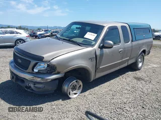 2001 Ford F-150 XL z VIN 2FTRX18L61CA78784, wystawiony jako IAAI lot #42228289 z przebiegiem 208 507 mil mil oraz . Historia ofert i sprzedaży dostępna na DreamBid. Obrazek 2.