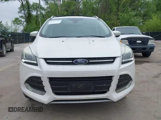 2016 Ford Escape Titanium with VIN 1FMCU9J96GUB97564, listed as a IAAI auction lot 42137663 with 269,009 mi miles. Bid and sale history available at carsss.com. Image 12.