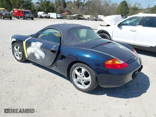 1999 Porsche Boxster with VIN WP0CA2983XU624800, listed as a IAAI auction lot 41897145 with 86,407 mi miles. Bid and sale history available at carsss.com. Image 3.