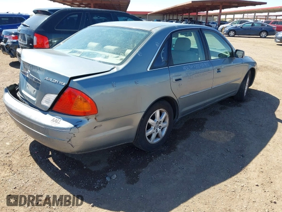 2001 Toyota Avalon XL z VIN 4T1BF28B31U150439, wystawiony jako IAAI lot #41868466 z przebiegiem 210 828 mil mil oraz . Historia ofert i sprzedaży dostępna na DreamBid. Obrazek 4.