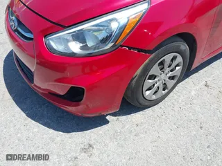 2015 Hyundai Accent GLS with VIN KMHCT4AE1FU801913, listed as a IAAI auction lot 42035825 with 104,701 mi miles. Bid and sale history available at carsss.com. Image 6.