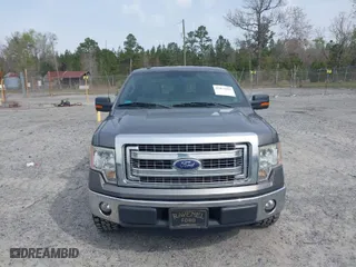 2013 Ford F-150 XL with VIN 1FTEX1CM8DFB14529, listed as a IAAI auction lot 41874583 with 157,757 mi miles. Bid and sale history available at carsss.com. Image 12.