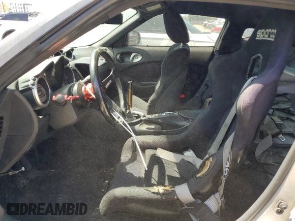 2010 Nissan 370Z with VIN JN1AZ4EH3AM504779, listed as a Copart auction lot 52937415 with 100,343 mi miles and Clean Title. Bid and sale history available at carsss.com. Image 7.