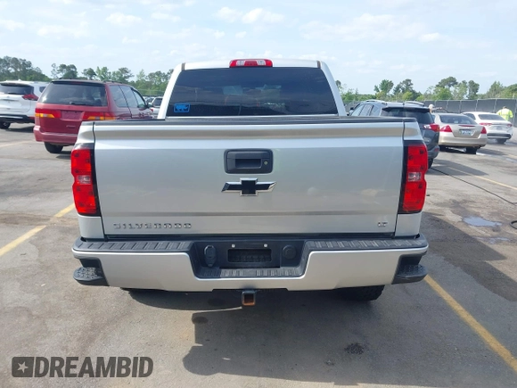 2017 Chevrolet Silverado 1500 LT with VIN 3GCUKREC5HG285689, listed as a IAAI auction lot 42055959 with 128,237 mi miles and . Bid and sale history available at DreamBid. Image 16.