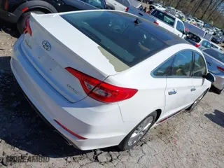 2015 Hyundai Sonata 2.4L Sport with VIN 5NPE34AF6FH227230, listed as a IAAI auction lot 41843379 with 186,332 mi miles. Bid and sale history available at carsss.com. Image 4.