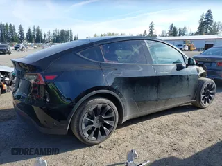 2021 Tesla Model Y Long Range with VIN 5YJYGDEE9MF301903, listed as a IAAI auction lot 42004007 with 26,740 mi miles. Bid and sale history available at carsss.com. Image 14.